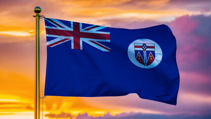 Fototapeta premium Yukon Territory Waving Flag Against a Cloudy Sky at Sunset.