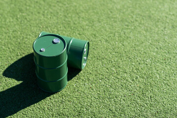oil barrels on green background
