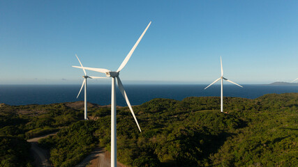 Top view of Wind Farm with wind turbines on the seashore. Wind power plant. Philippines.