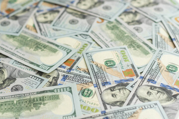 Texture of dollar bills. One hundred dollars. Close-up.