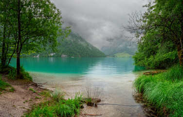 A view to the Berchtesgaden Königssee lake which have crystal clear drink water quality embedded...