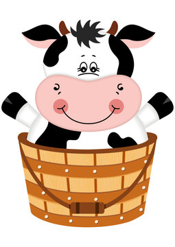 Funny cow in a wooden bucket