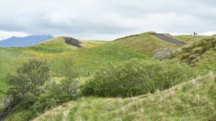 Fototapeta premium Beautiful view of lush green hills and fields of Iceland