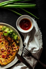 Vertical shot of a freshly made delicious omelet