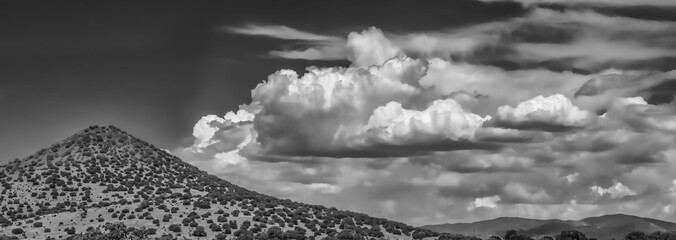 Grayscale of clouds over Sangre de Cristo Mountains in Santa Fe, New Mexico, USA