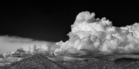 Grayscale of clouds over Sangre de Cristo Mountains in Santa Fe, New Mexico, USA
