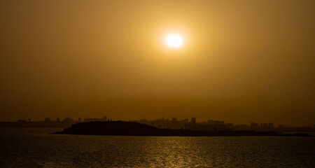 Hazy sunset skyline of Dakar, Senegal, West Africa