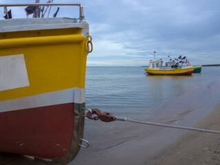 Fishing boats on the seashore