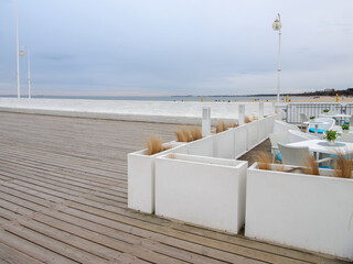 Pier, summer cafe on the seashore