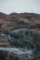 Papier Peint photo Viaduc de Glenfinnan Vertical shot of the Glenfinnan Viaduct in Scotland.