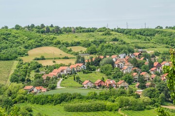 Panorama of the settlement of Sremski Karlovci from the mountain Fruska Gora near Novi Sad - obrazy, fototapety, plakaty