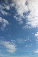 Blue sky background with clouds