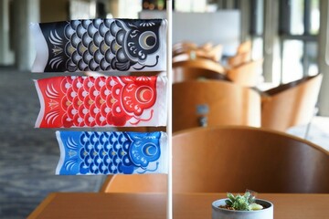 春の部屋の中を背景にこいのぼり