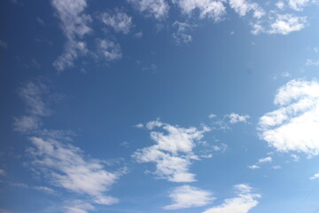 white clouds with blue sky