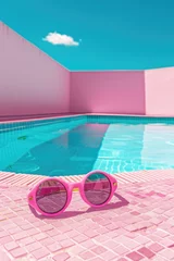 Foto op Canvas Pink sunglasses resting by a pool, perfect for summer vibes © Fotograf