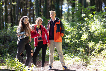 Group of Young People Standing in the Woods