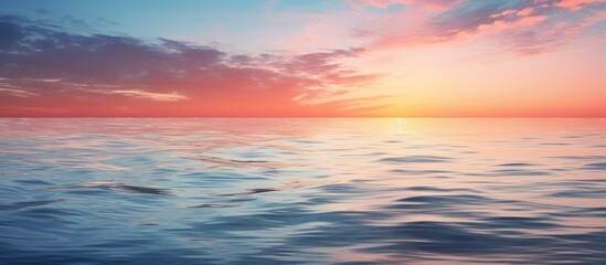 Naklejka na ściany i meble Sunset glow on ocean with distant boat