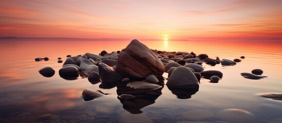 Sunset on rocky shore with diverse rocks