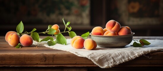 Peaches in bowl on table