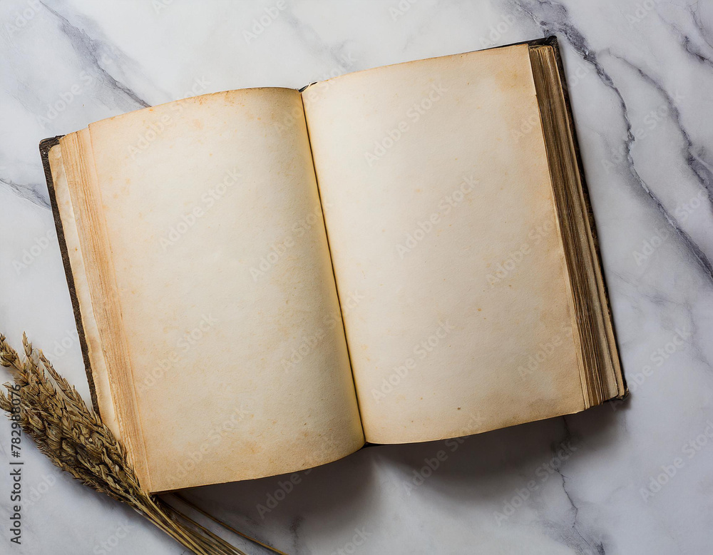 Poster old opened book with blank pages on white gray marble background. top view. mockup template book pag