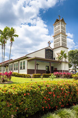 Church of La Fortuna de San Carlos park and flowers in Costa Rica Central America