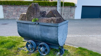 Historic Pink Sandstone Quarry Cart Display in Buhl Village, Alsace, France