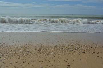 POV photo of the shoreline of a beach in Portugal.