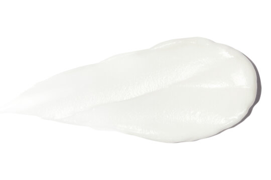 A smear of cream on a blank background.