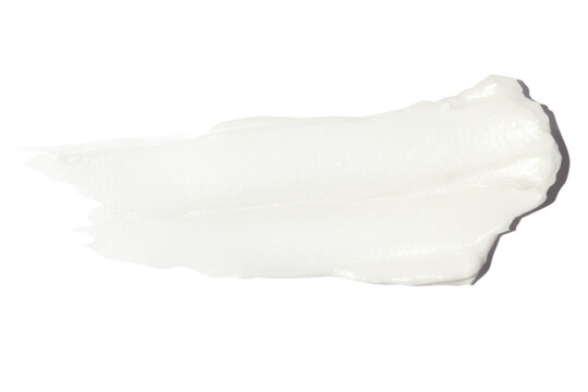 A smear of cream on a blank background.
