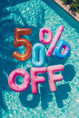 Summer sale 50 percent discount. Overhead view of a swimming pool with inflatable pool floats - 783005474