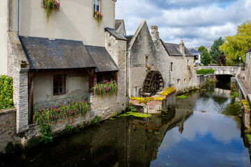 The water mill on the River Aure in the medieval town of Bayeux on the Normandy Coast of France.