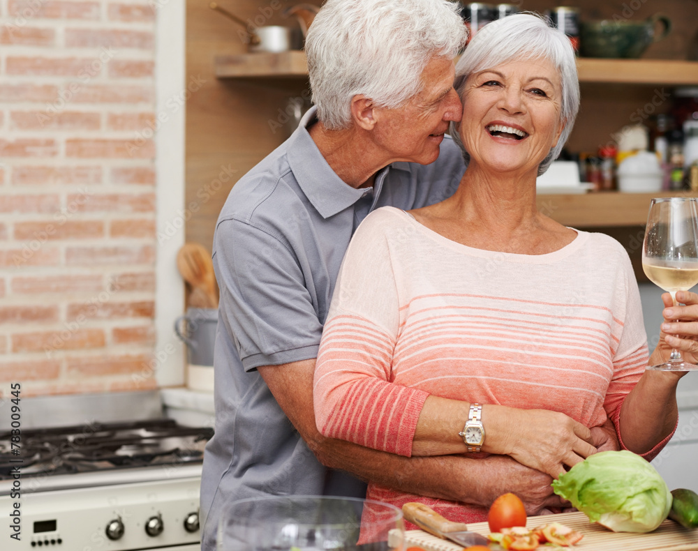 Poster Senior couple, hug and love in kitchen with wine for retirement, celebration and cooking in apartment. Old man, woman and vacation for happiness, commitment and wellness in modern house for holiday.