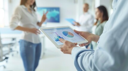 Obraz premium Professionals Discussing Digital Reports