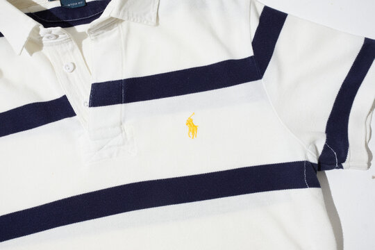 kent, uk, 01.01.2023 vintage polo ralph lauren shirt size small striped horizontal 1990s blue white yellow logo. official designer polo merchandise.