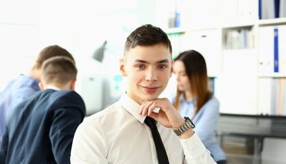 Handsome man in suit and tie look in camera on chest background. White collar dress code modern office lifestyle graduate college study profession idea coach train concept
