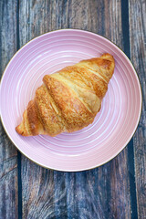Crispy, fresh croissants, Concept of food, bakery, breakfast ideas, taste, freshness. Poser. Copy space for ad