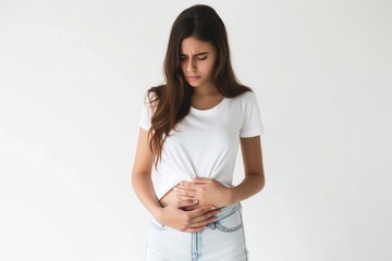 Young lady with tummy ache, empty space, isolated - obrazy, fototapety, plakaty