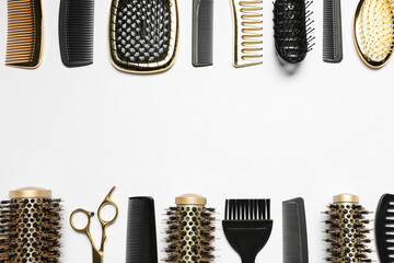 Hairdressing tools on white background, flat lay. Space for text