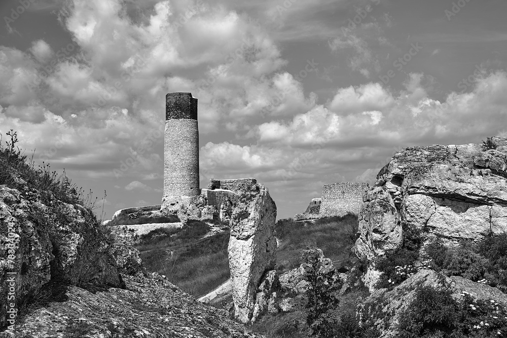 Poster limestone rocks and ruins of a medieval castle with a tower in olsztyn