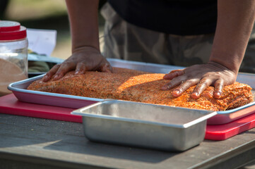 View of seasoning the barbecue meat