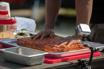 View of seasoning the barbecue meat