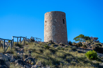 Mediterranean coastal landscape. Historic Torre Vigia De Cerro Gordo, a watchtower looking out for...