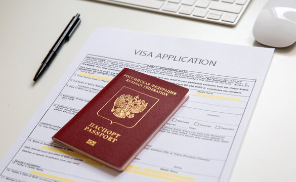 Close up of a visa application document with a Russian passport