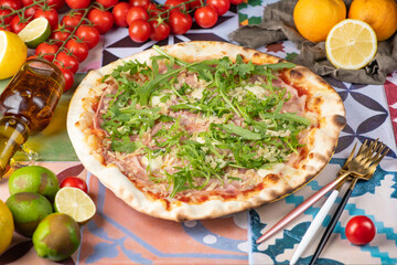 Pizza: A beloved Italian dish consisting of a round, flattened dough topped with tomato sauce, cheese, and various toppings such as pepperoni, mushrooms, and vegetables, baked in a hot oven until the 