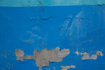 Vintage wallpaper or old wall texture photo of old blue wall which color was tear until you can see...