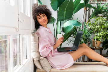 Authentic portrait of beautiful expressive hispanic young woman at home - Domestic daily life,...