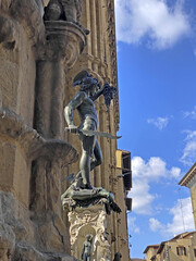 Bronze statue of Perseus holding the head of Medusa in Florence, Piazza della Signoria square, made by Benvenuto Cellini in 1545.