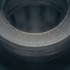 close up of car tire on white background