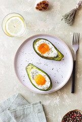 Avocado baked with egg. Healthy eating. Diet.