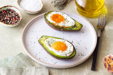 Avocado baked with egg. Healthy eating. Diet.